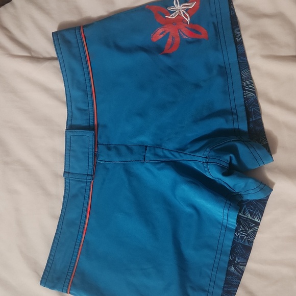 Crazy shirts shorts blue reversible size small.  Blue with orange trim - Picture 3 of 4